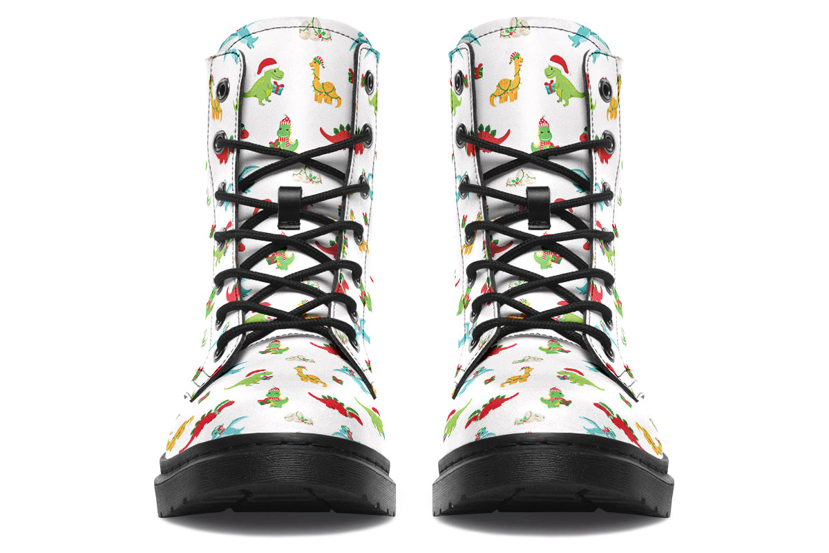 White boots featuring a pattern of different dinosaurs in Christmas hats and scarves. Some are holding gifts.
