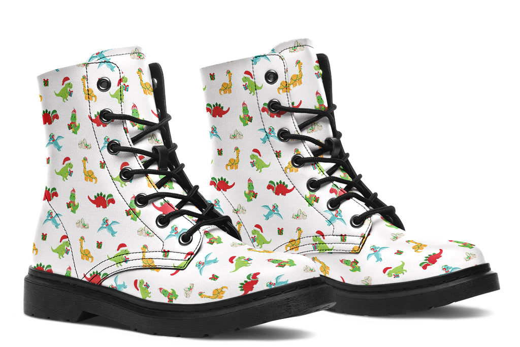 White boots featuring a pattern of different dinosaurs in Christmas hats and scarves. Some are holding gifts.