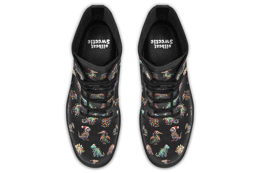 Black boots featuring a pattern of different dinosaurs wrapped in Christmas lights. Some are also wearing Christmas hats.