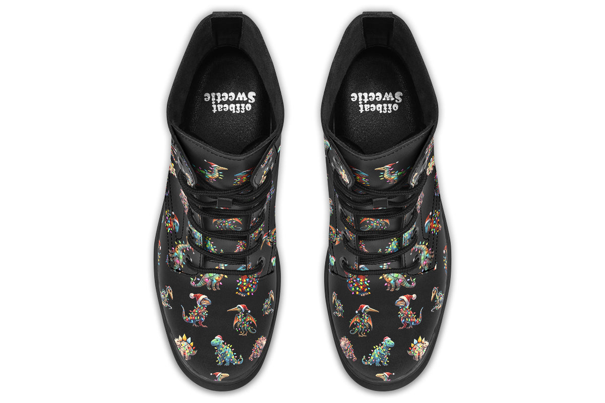 Black boots featuring a pattern of different dinosaurs wrapped in Christmas lights. Some are also wearing Christmas hats.
