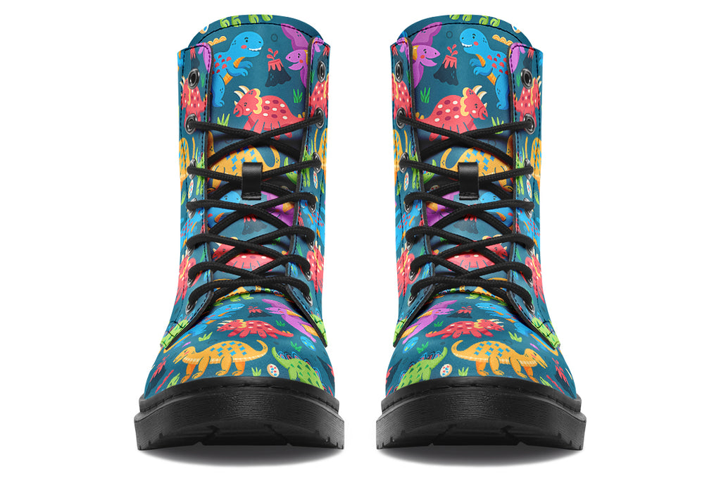 Teal boots with a pattern of dinosaurs in different colours