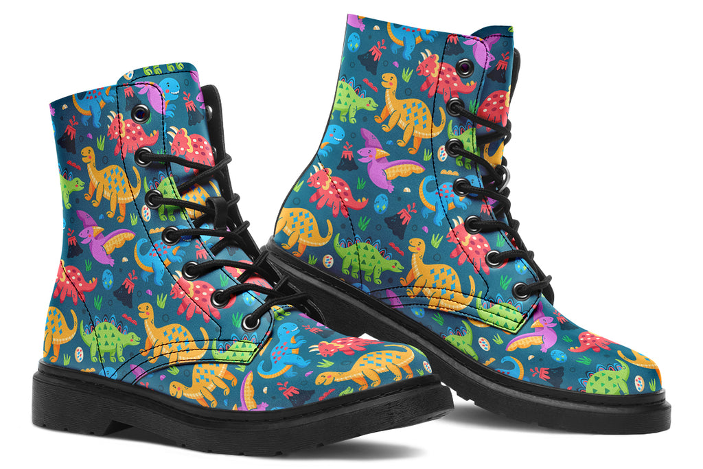 Teal boots with a pattern of dinosaurs in different colours