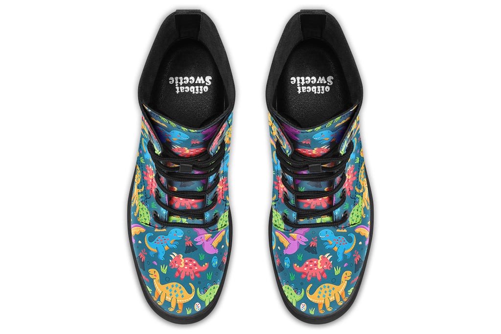 Teal boots with a pattern of dinosaurs in different colours
