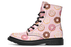 Pink boots with a pattern of donuts all over them