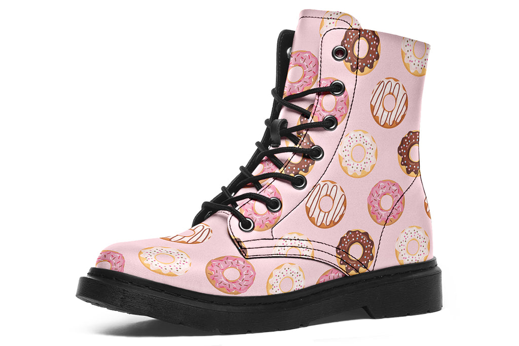Pink boots with a pattern of donuts all over them
