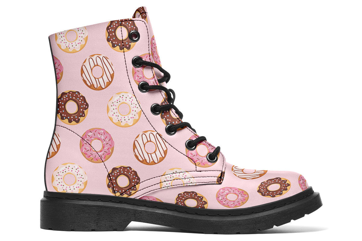 Pink boots with a pattern of donuts all over them