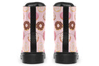 Pink boots with a pattern of donuts all over them