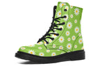 Light green boots with a white daisy pattern