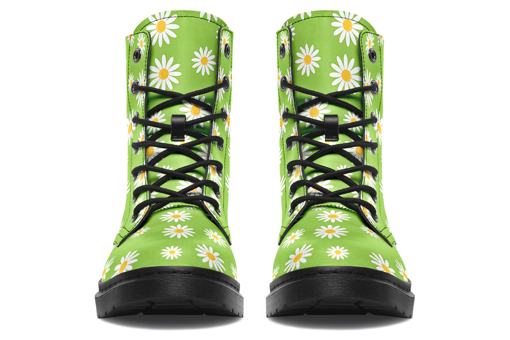 Light green boots with a white daisy pattern