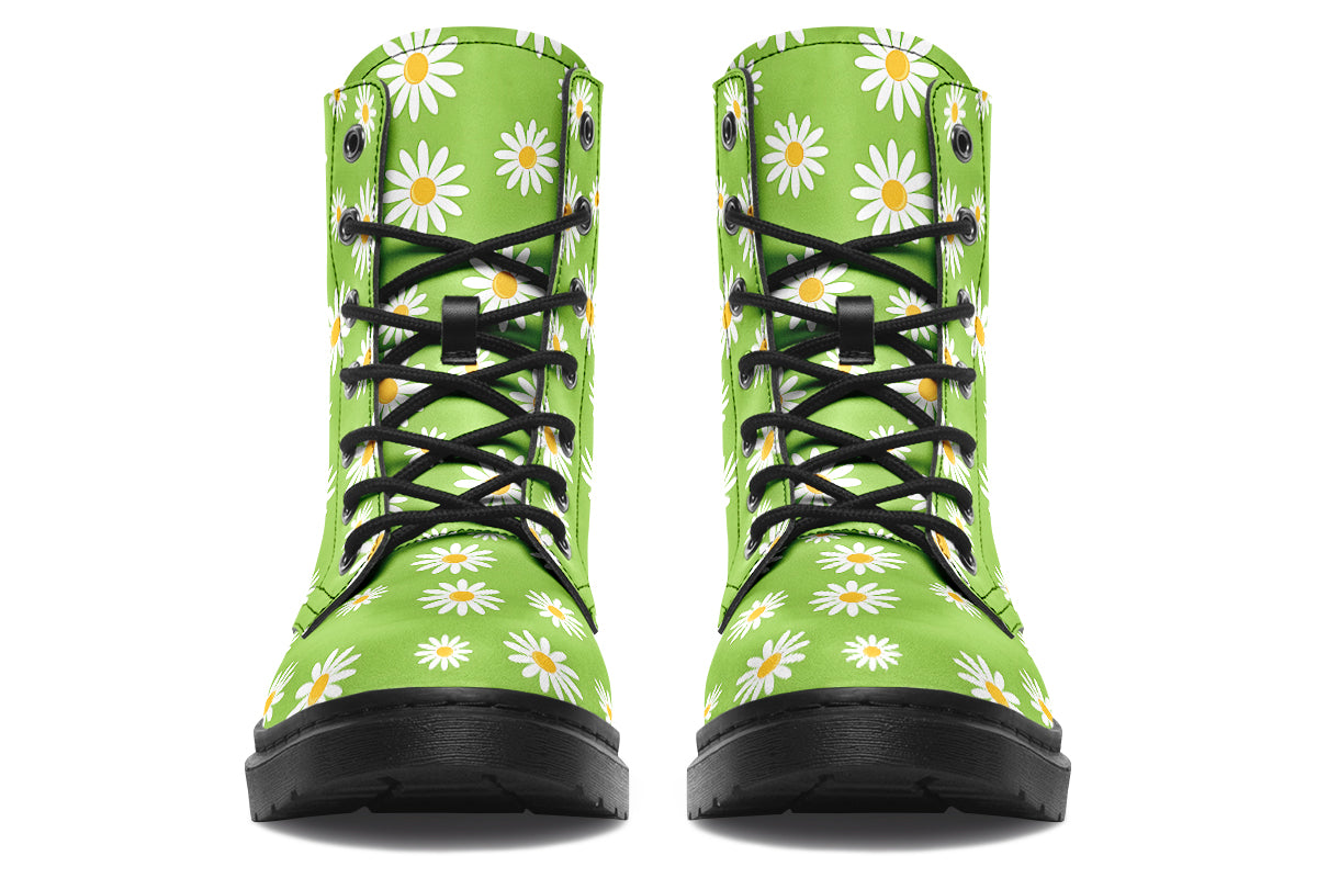 Light green boots with a white daisy pattern