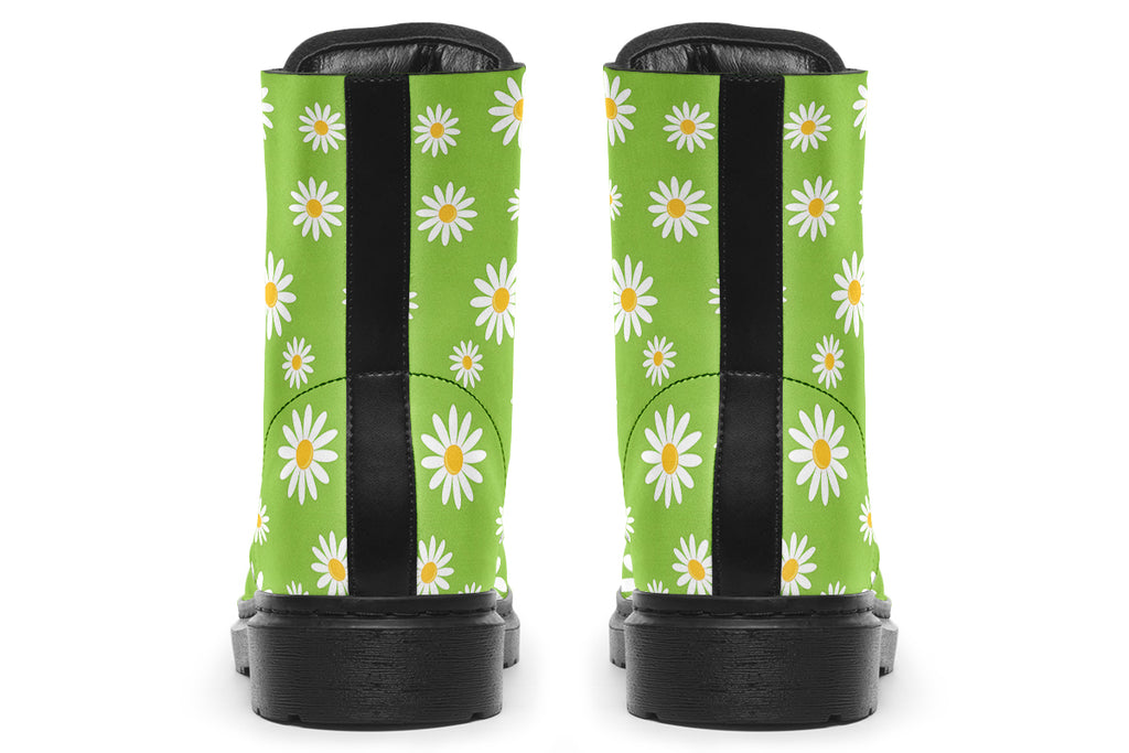 Light green boots with a white daisy pattern