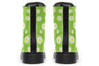 Light green boots with a white daisy pattern