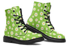 Light green boots with a white daisy pattern
