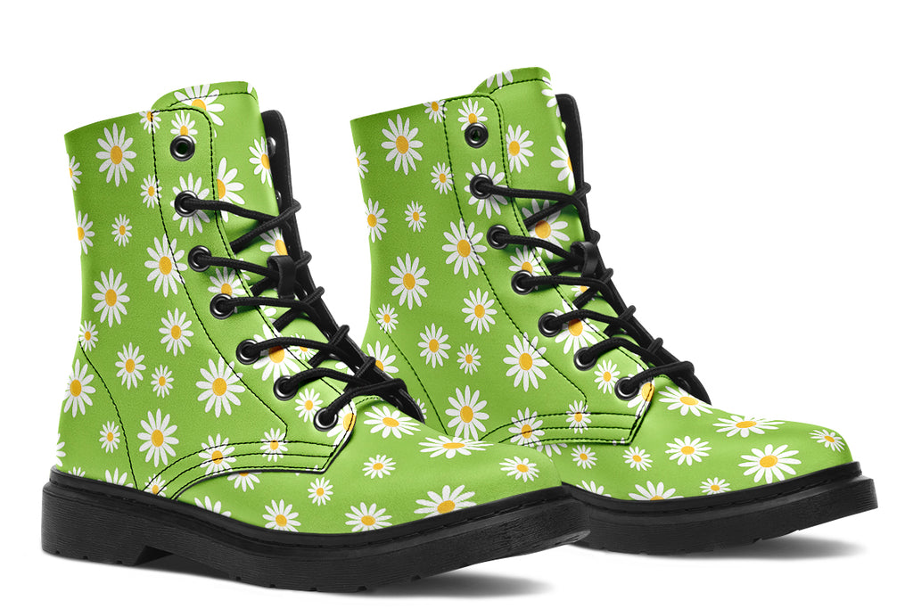 Light green boots with a white daisy pattern