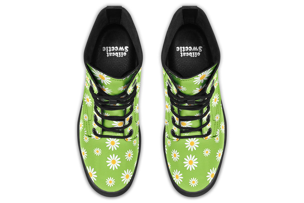Light green boots with a white daisy pattern