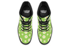 Light green boots with a white daisy pattern