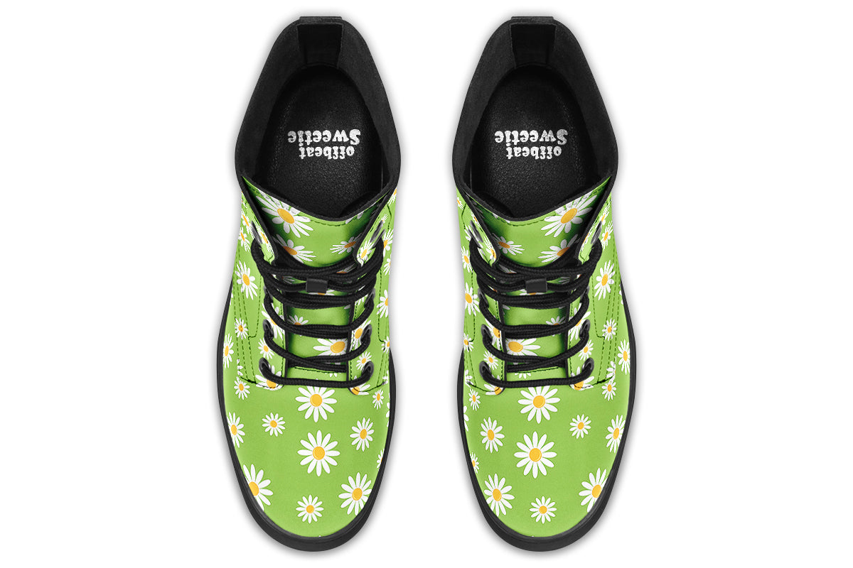 Light green boots with a white daisy pattern
