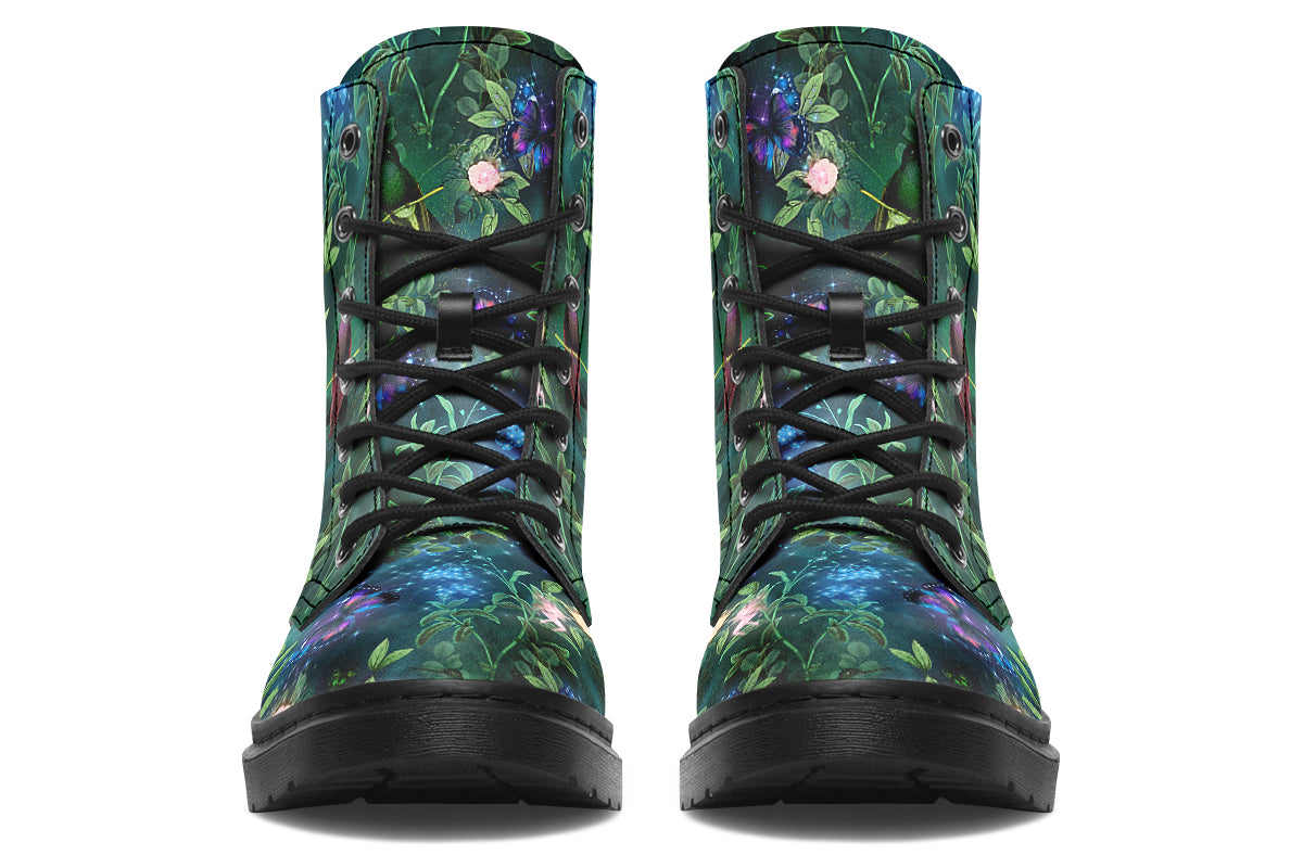 Dark green boots featuring a garden design with fairies and butterflies