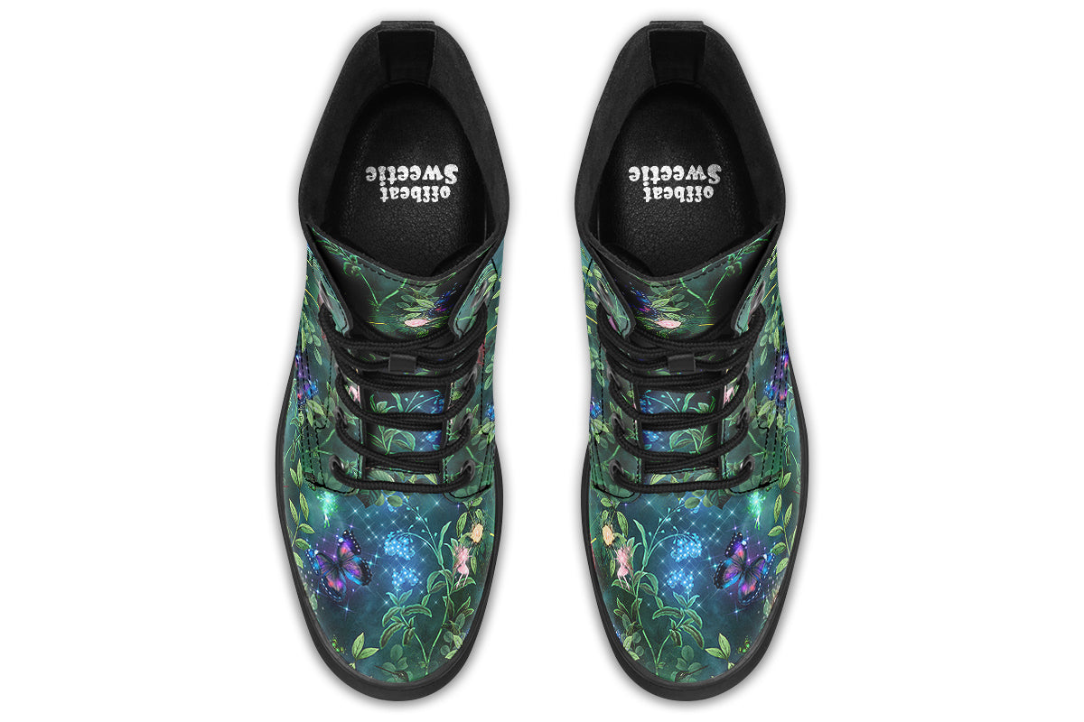 Dark green boots featuring a garden design with fairies and butterflies