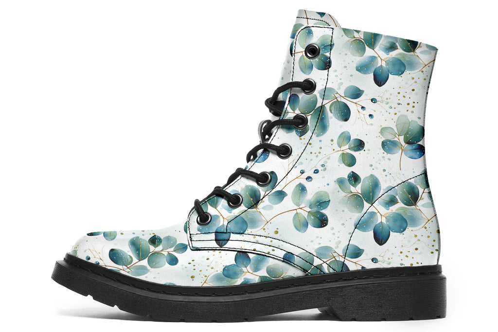 White boots featuring a green eucalyptus leaves pattern