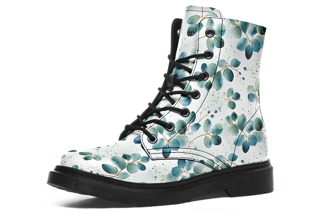 White boots featuring a green eucalyptus leaves pattern