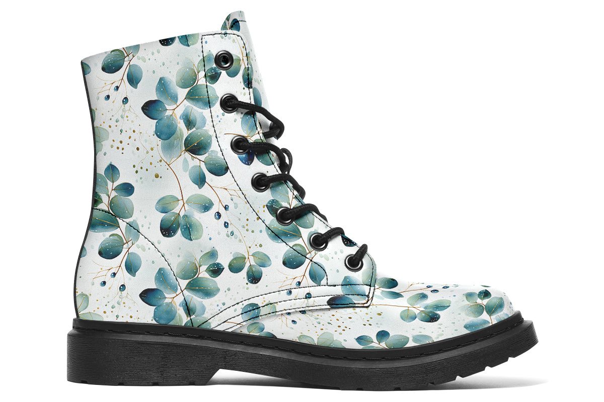 White boots featuring a green eucalyptus leaves pattern