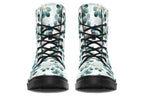 White boots featuring a green eucalyptus leaves pattern