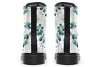 White boots featuring a green eucalyptus leaves pattern