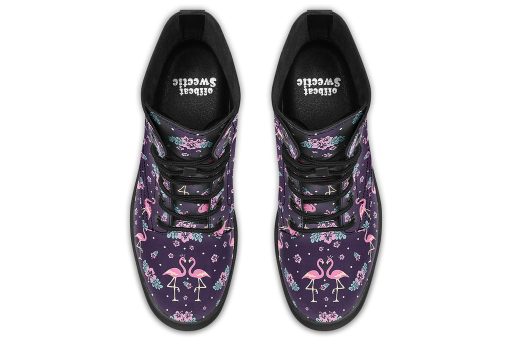 Dark plum coloured boots with a pattern of pink flamingoes and pink flowers with green leaves