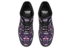 Dark plum coloured boots with a pattern of pink flamingoes and pink flowers with green leaves