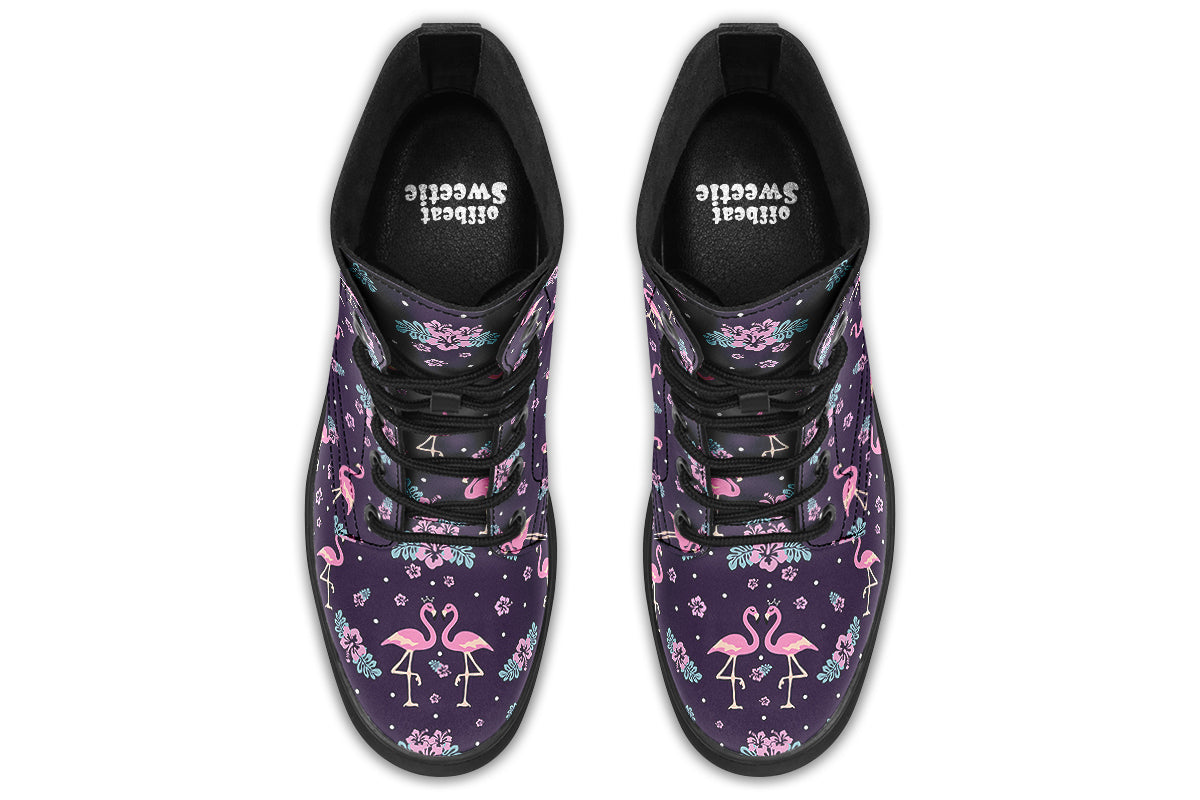 Dark plum coloured boots with a pattern of pink flamingoes and pink flowers with green leaves