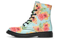 Light blue boots with a pattern of florals in oranges and pinks.