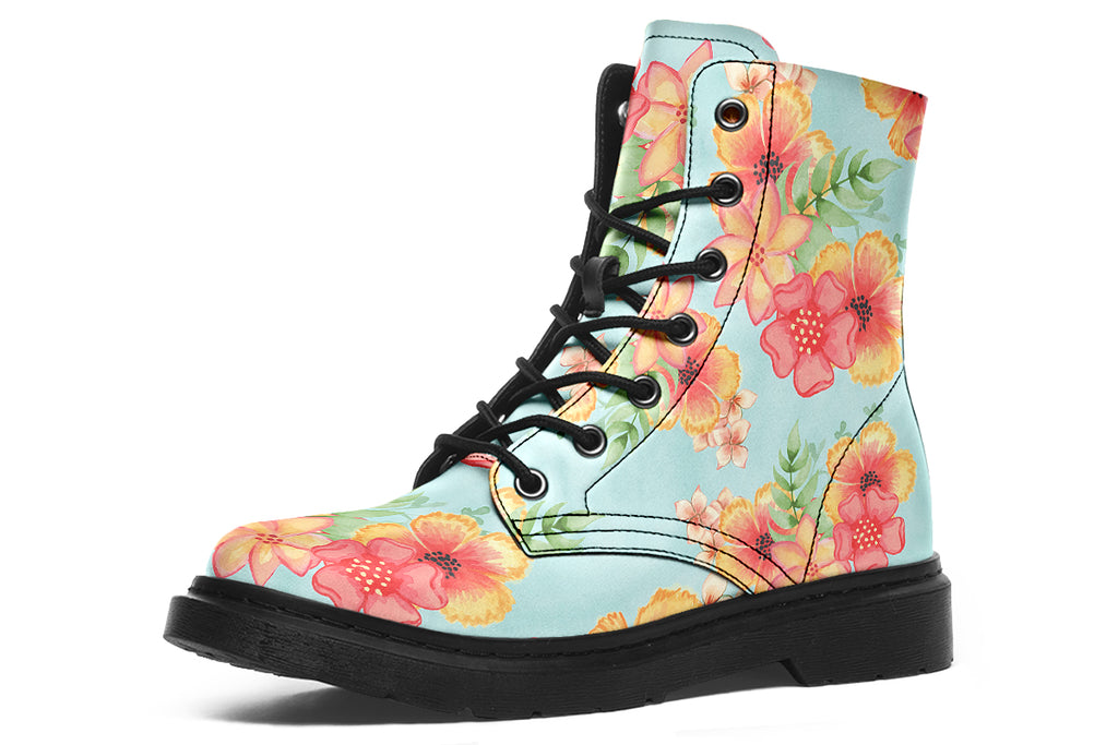 Light blue boots with a pattern of florals in oranges and pinks.