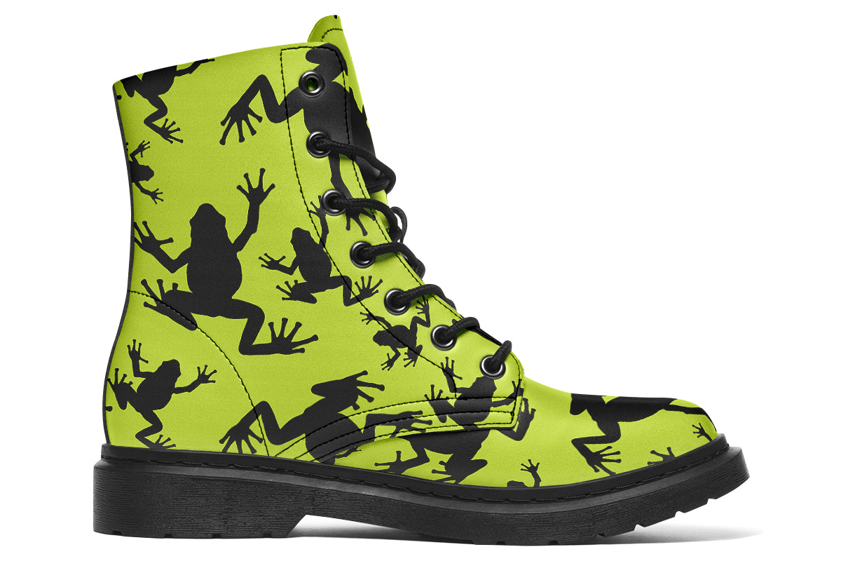 Design features black frog silhouettes on a vibrant green background.