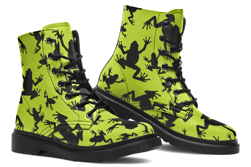 Design features black frog silhouettes on a vibrant green background.