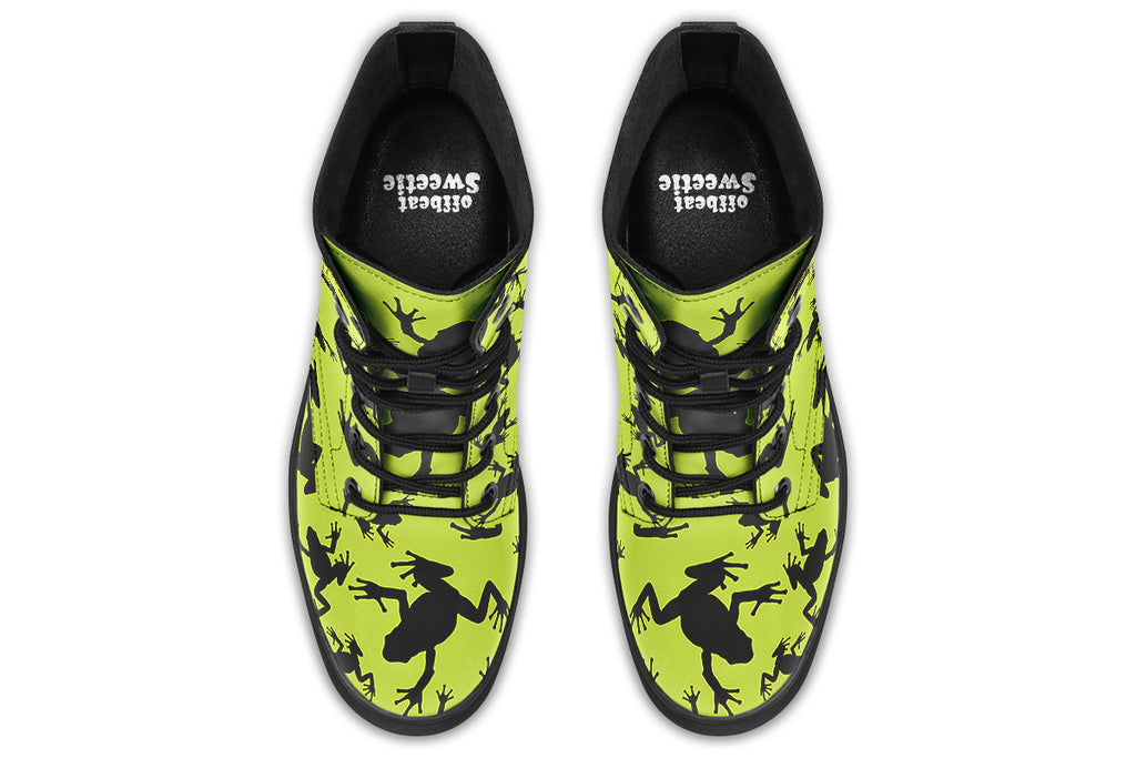 Design features black frog silhouettes on a vibrant green background.