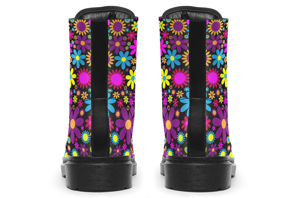 Black boots with a retro floral design in pinks, purples and yellows.