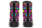 Black boots with a retro floral design in pinks, purples and yellows.