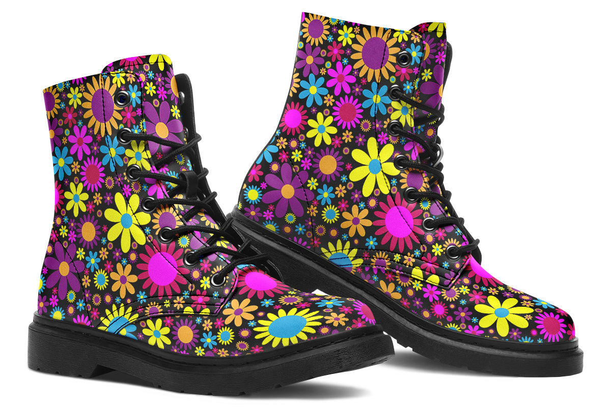 Black boots with a retro floral design in pinks, purples and yellows.