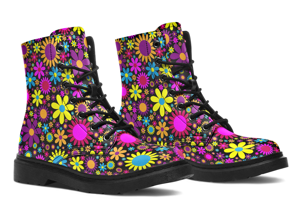 Black boots with a retro floral design in pinks, purples and yellows.