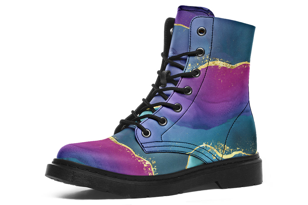 Boots featuring a geode design in purples, blues and pinks, with stripes of gold diving some of the colours.