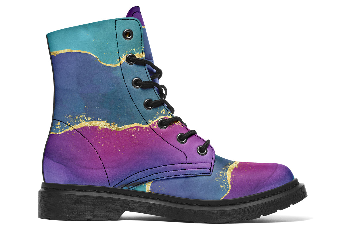 Boots featuring a geode design in purples, blues and pinks, with stripes of gold diving some of the colours.