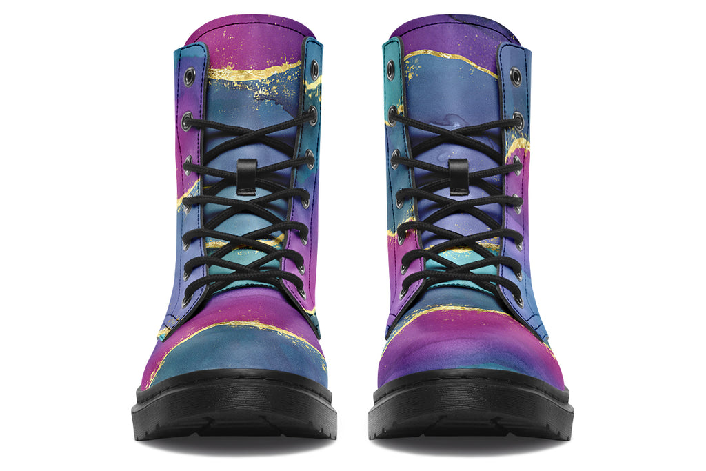 Boots featuring a geode design in purples, blues and pinks, with stripes of gold diving some of the colours.
