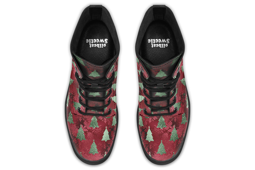 These boots feature a deep red patterned background, like something you might find on a Christmas table cloth. There are green Christmas trees over the red, designed to look like they are textured and shimmering.