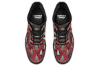 These boots feature a deep red patterned background, like something you might find on a Christmas table cloth. There are green Christmas trees over the red, designed to look like they are textured and shimmering.