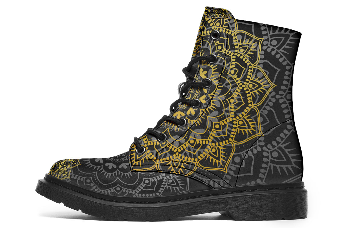Black boots with a gold/yellow mandala design.