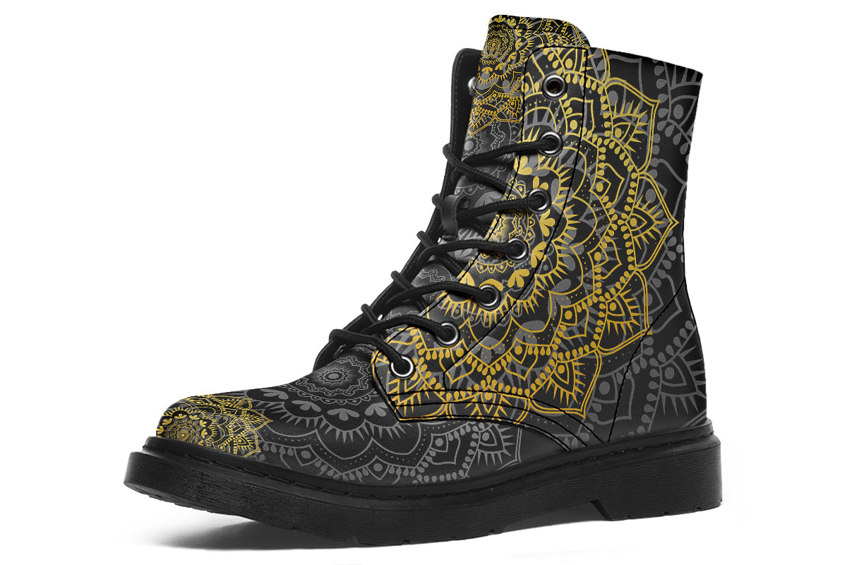 Black boots with a gold/yellow mandala design.