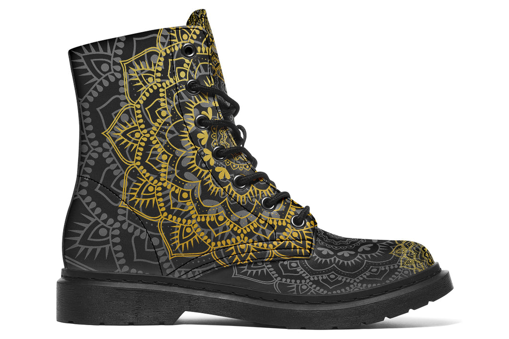 Black boots with a gold/yellow mandala design.