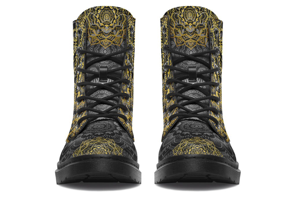 Black boots with a gold/yellow mandala design.