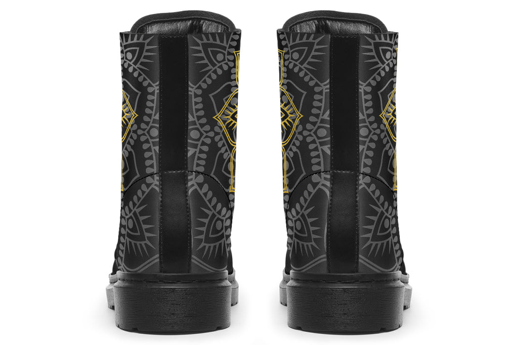 Black boots with a gold/yellow mandala design.